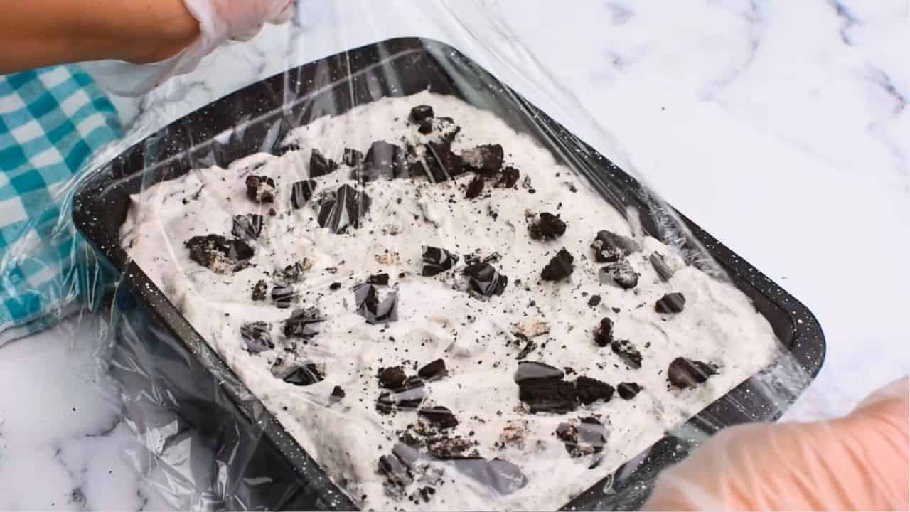 cover the ice cream with a plastic wrap